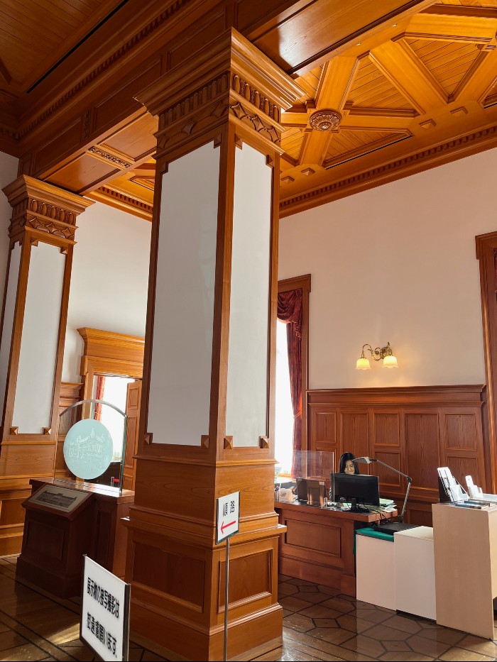 Inside, the beautiful woodwork and the nice lady at the desk