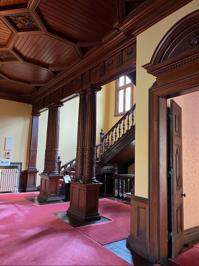 Hall and stairway with beautifully carved columns